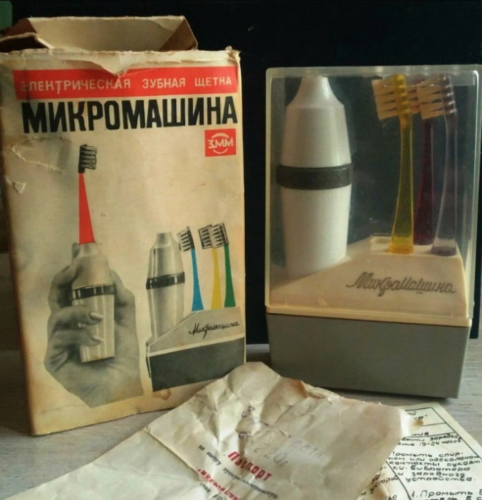 Электрическая зубная щетка
